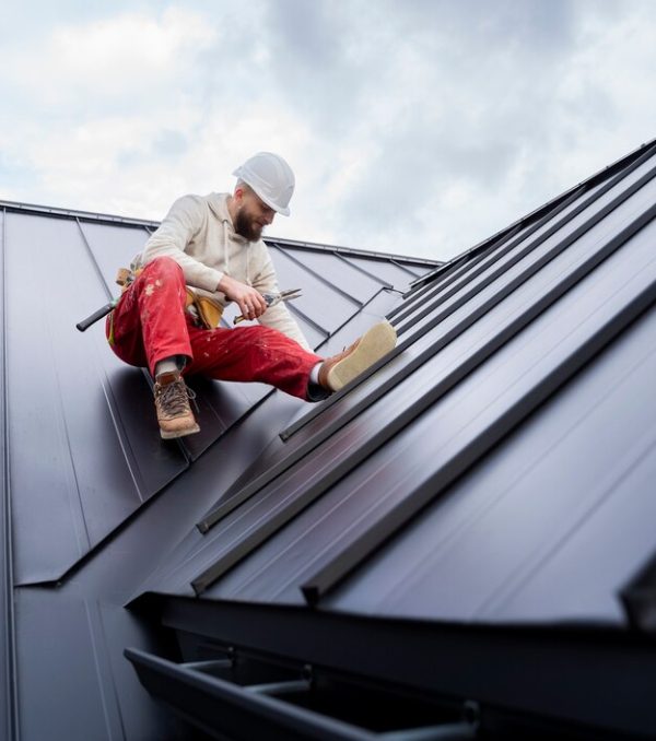 full-shot-man-working-roof_23-2149343660