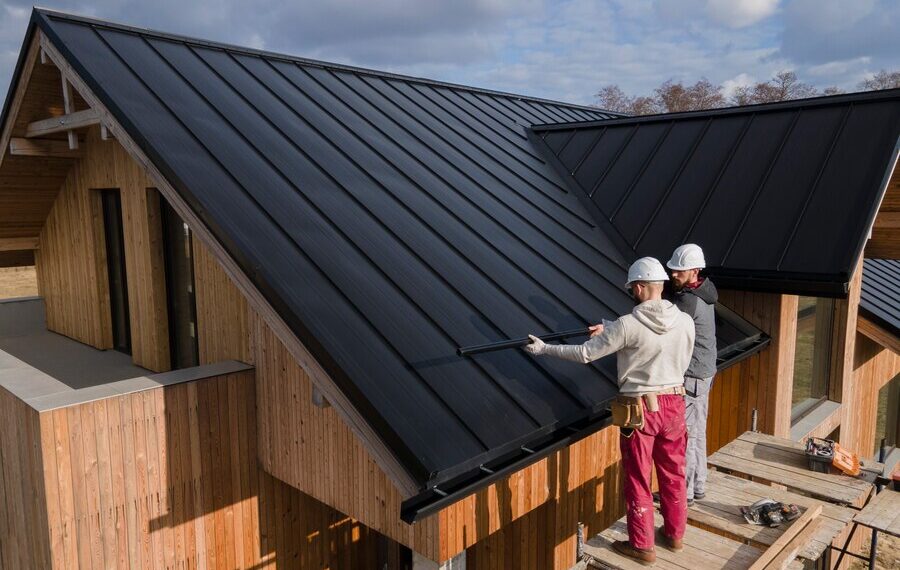full-shot-roofers-working-together-with-helmets_23-2149343707